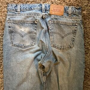 Levi's 550 Light Blue Denim Jeans with Gold Stitching